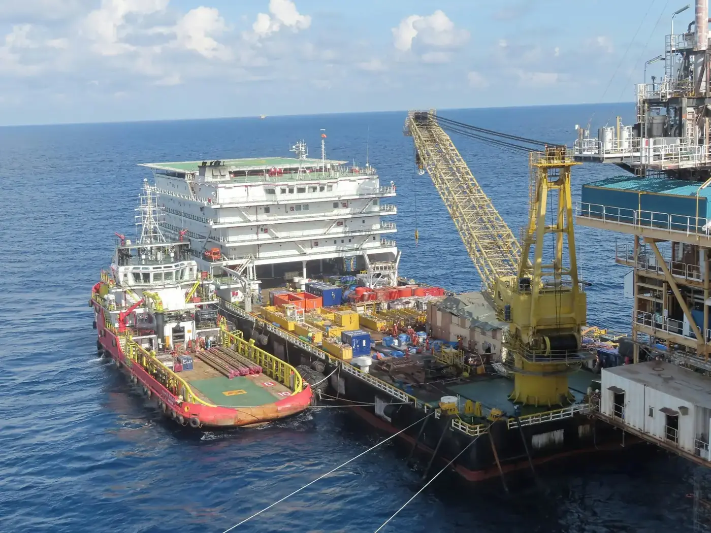 Offshore supply vessels alongside a marine terminal