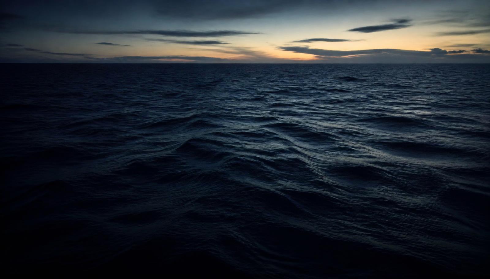 Deep navy ocean horizon